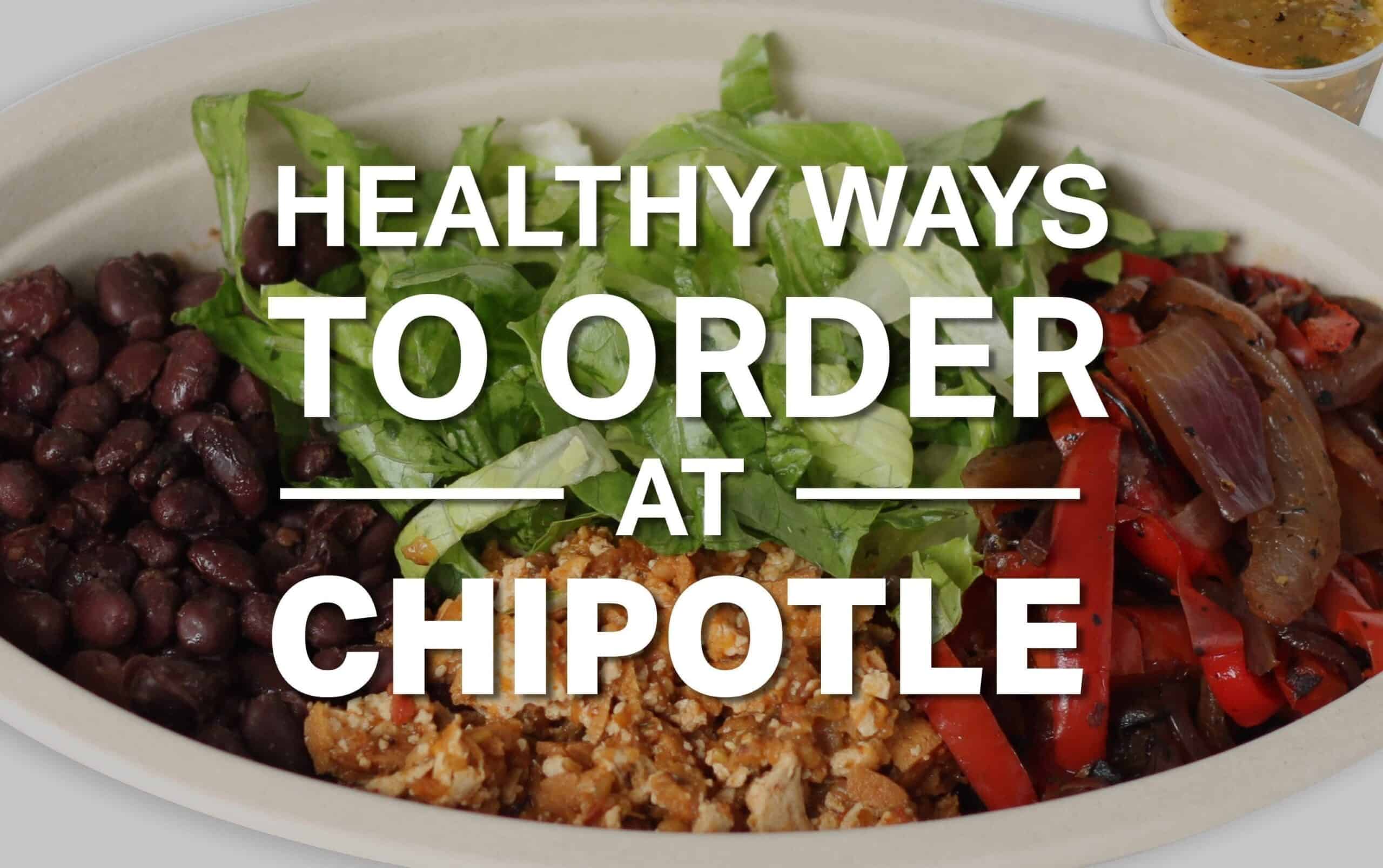 A white bowl filled with black beans, lettuce, grilled vegetables, and shredded meat from Chipotle. Overlaid text reads "Healthy Ways to Order at Chipotle." In the background, a cup of sauce is partially visible. MyFitnessPal Blog